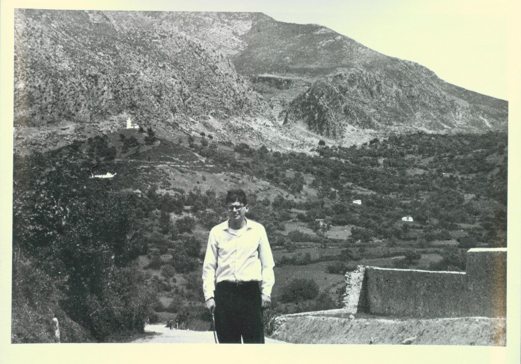 Allen Ginsberg in front of hillside, Xauan, Morocco