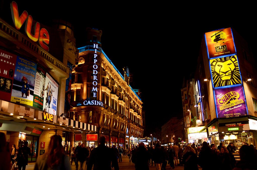 Leicester Square at night (Source: Gian Cornachini, Flickr)
